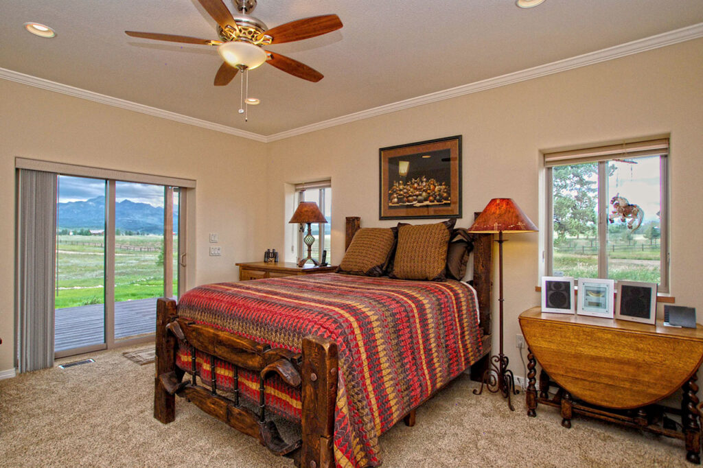 BEDROOM WITH CARPET, AND CROWN MOLDING TRIM